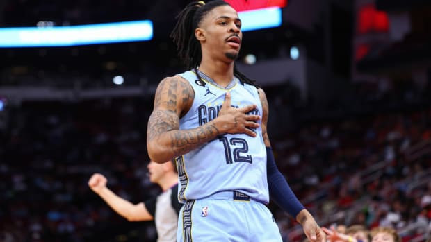 Mar 1, 2023; Houston, Texas, USA; Memphis Grizzlies guard Ja Morant (12) reacts after scoring a basket during the first quarter against the Houston Rockets at Toyota Center. Mandatory Credit: Troy Taormina-USA TODAY Sports